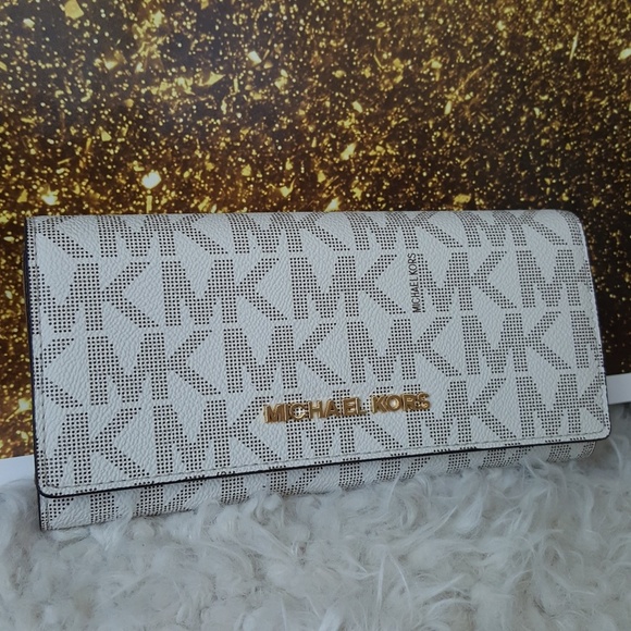 MICHAEL Michael Kors Handbags - SOLD NWT Michael Kors jet set carryall wallet
